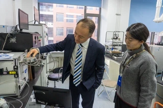 Bradley Ladewig and Ms Ren in the lab tour at Beijing University of Technology